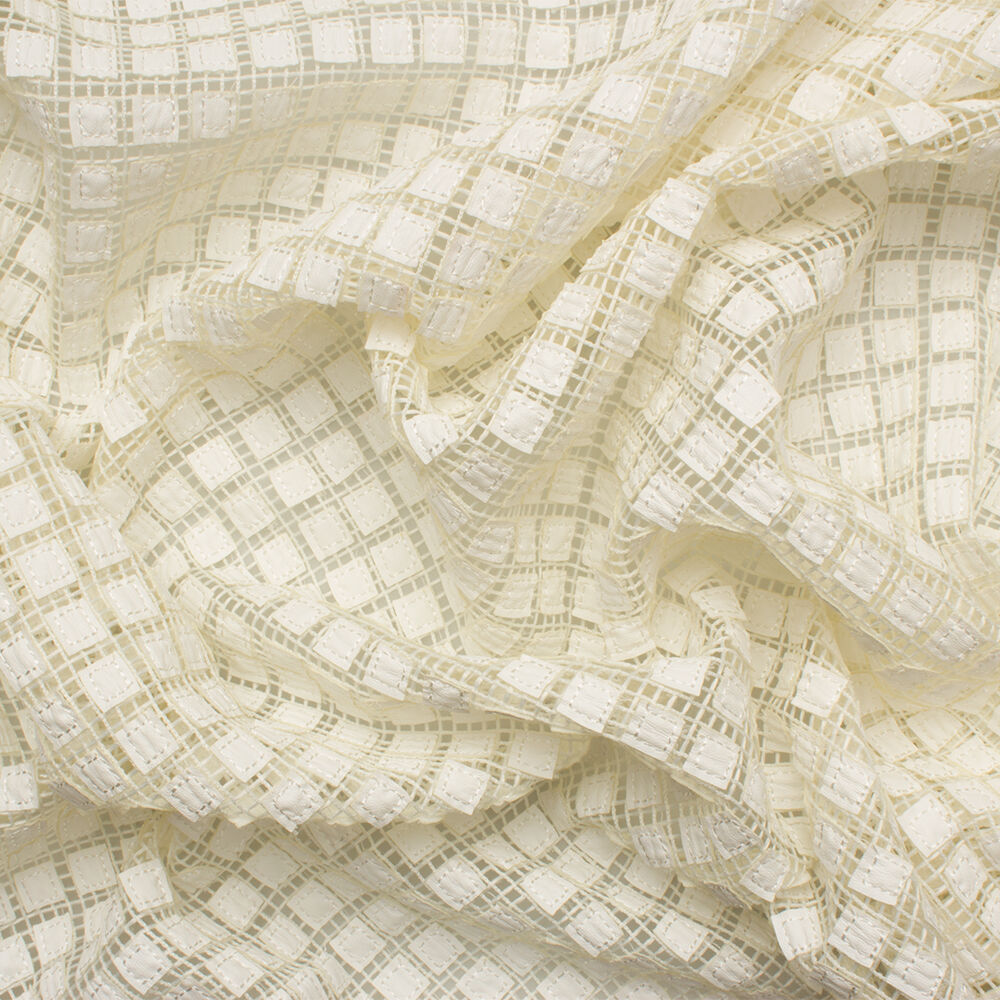 Cream Laser Cut PVC on Mesh