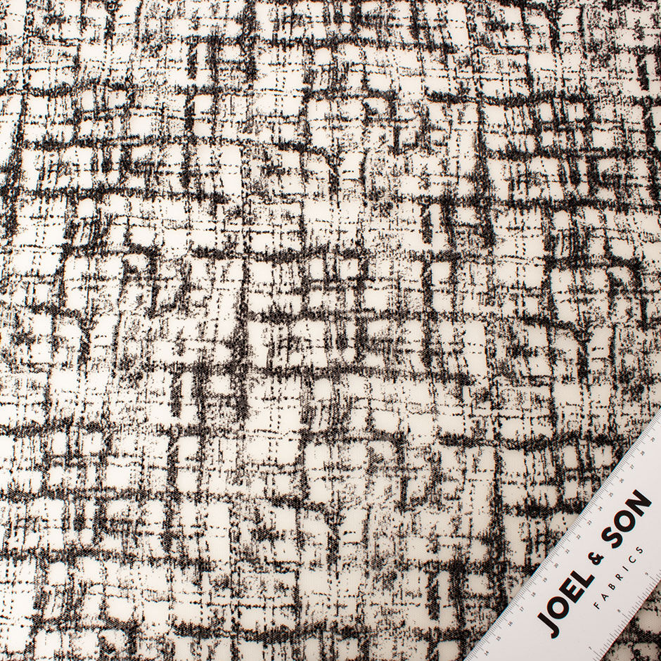 Black Flocked Nude Tulle