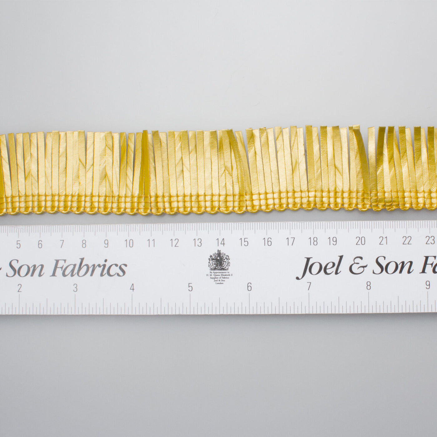 Gold Leather Look Fringed Trim